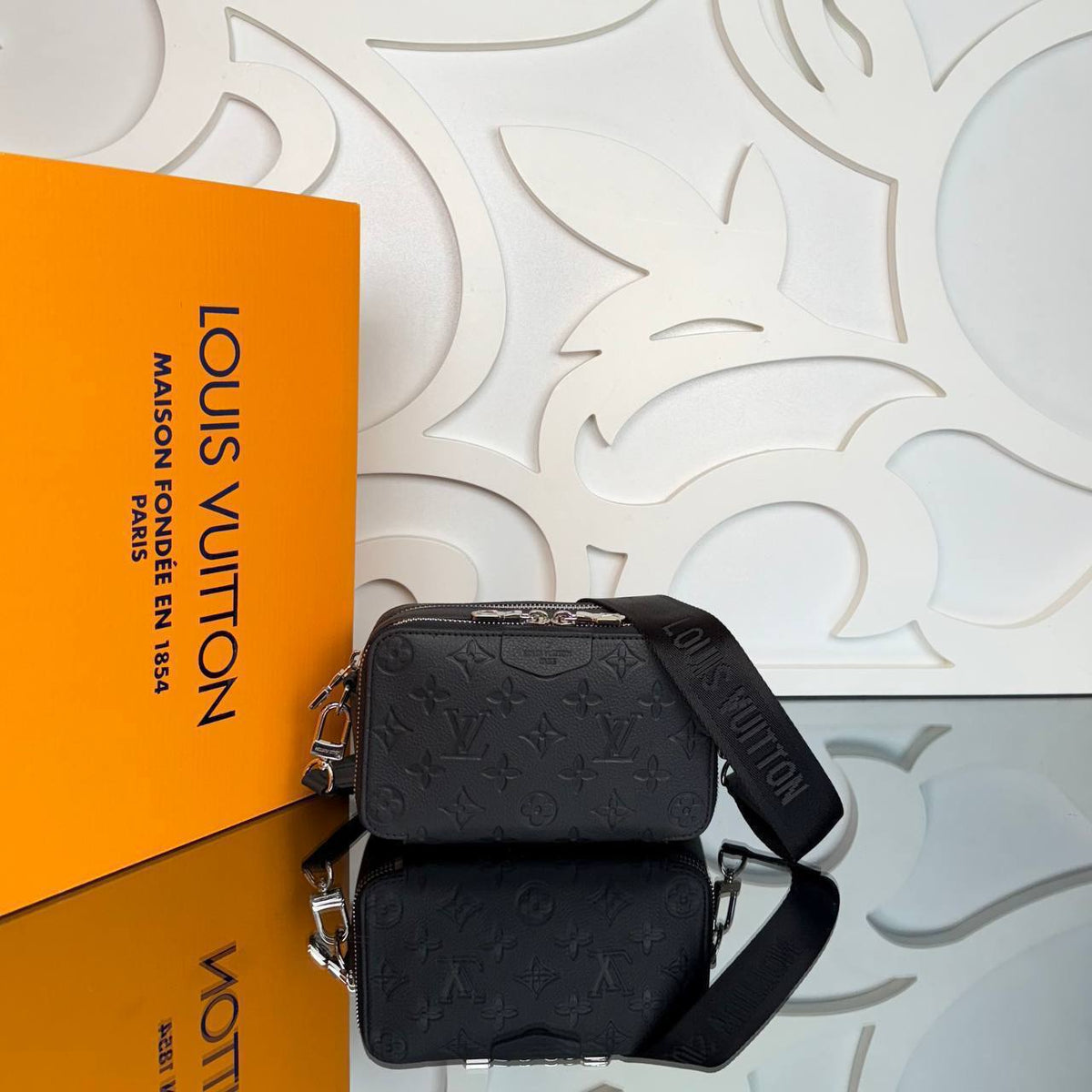 Alpha Wearable Wallet - Black Embossed Monogram