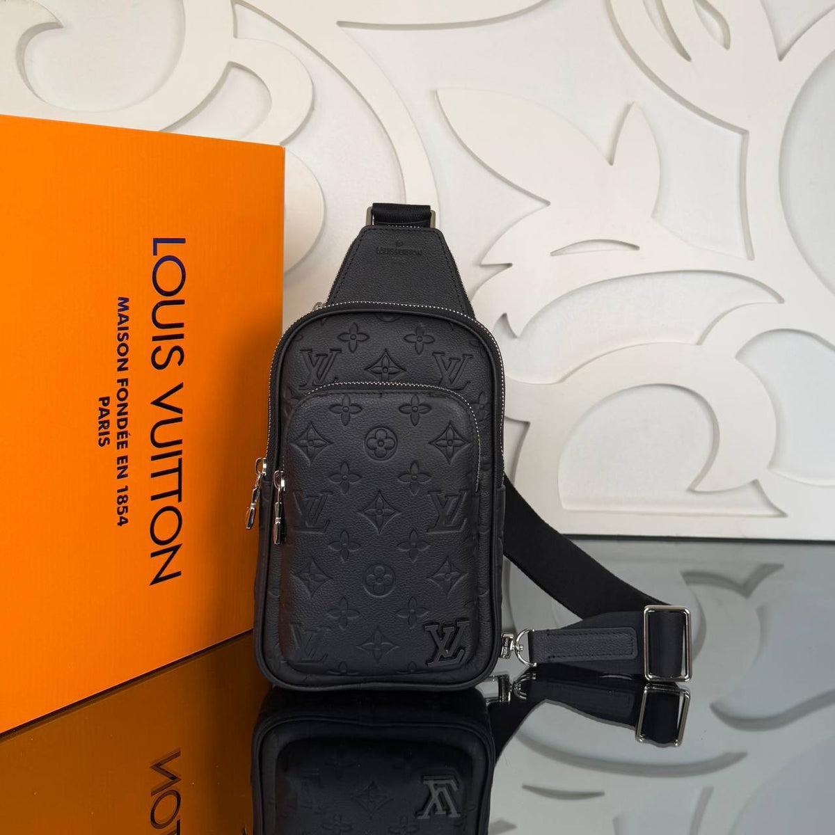Avenue Sling Bag PM | Black Embossed Monogram | front