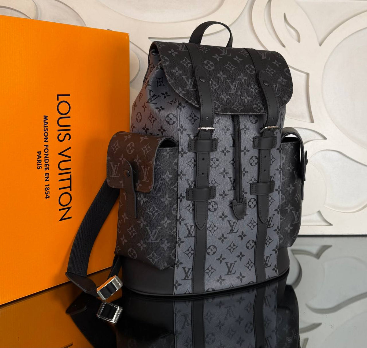 Christopher MM Backpack | Gray Monogram | angled view